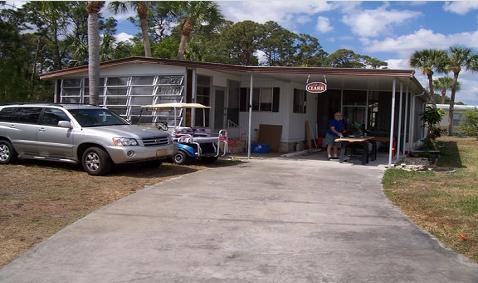 Customer DIY project: the Clark home, with an aluminum carport and enclosed screen room